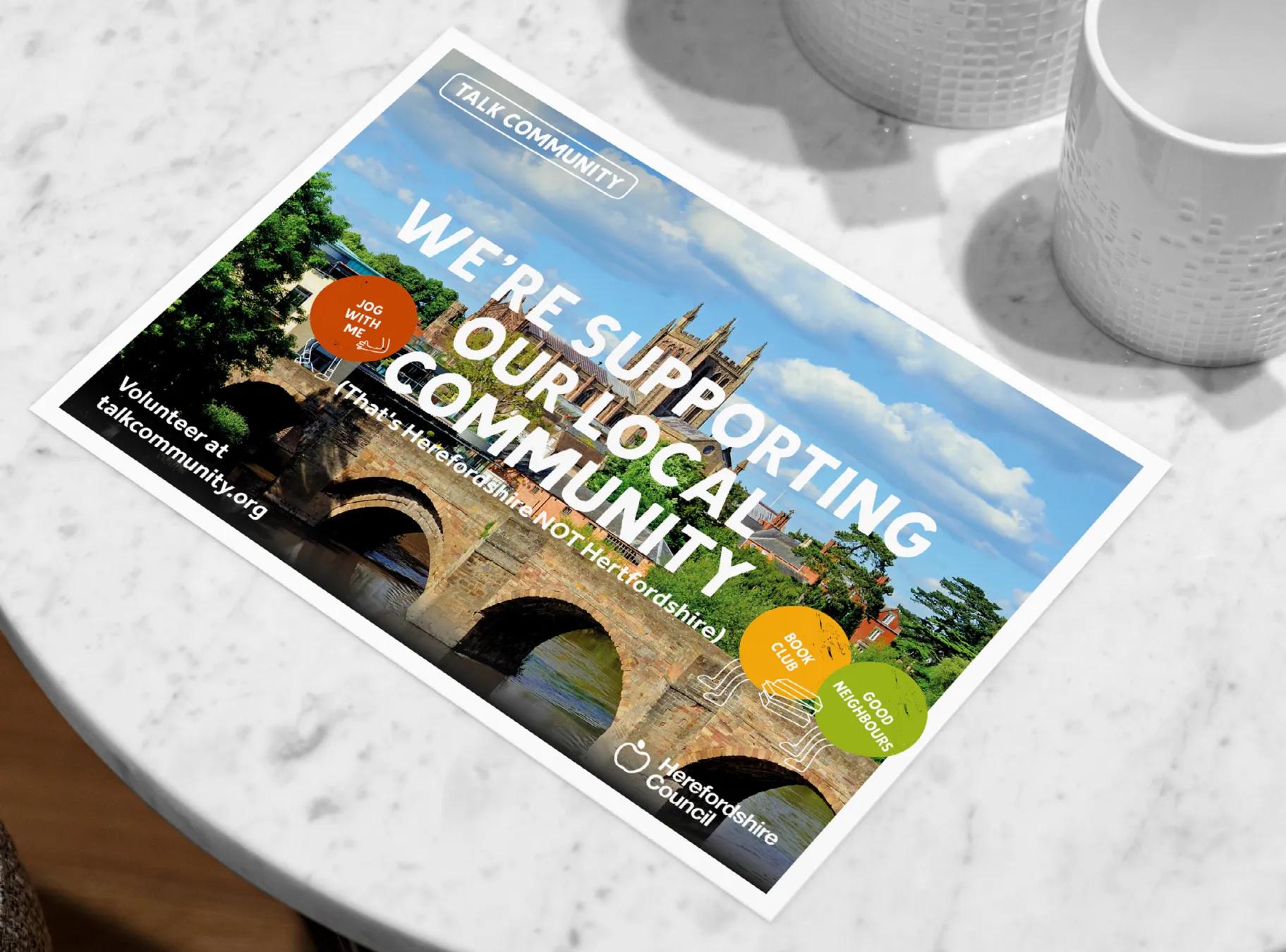 postcard with the caption 'we're supporting our local community'