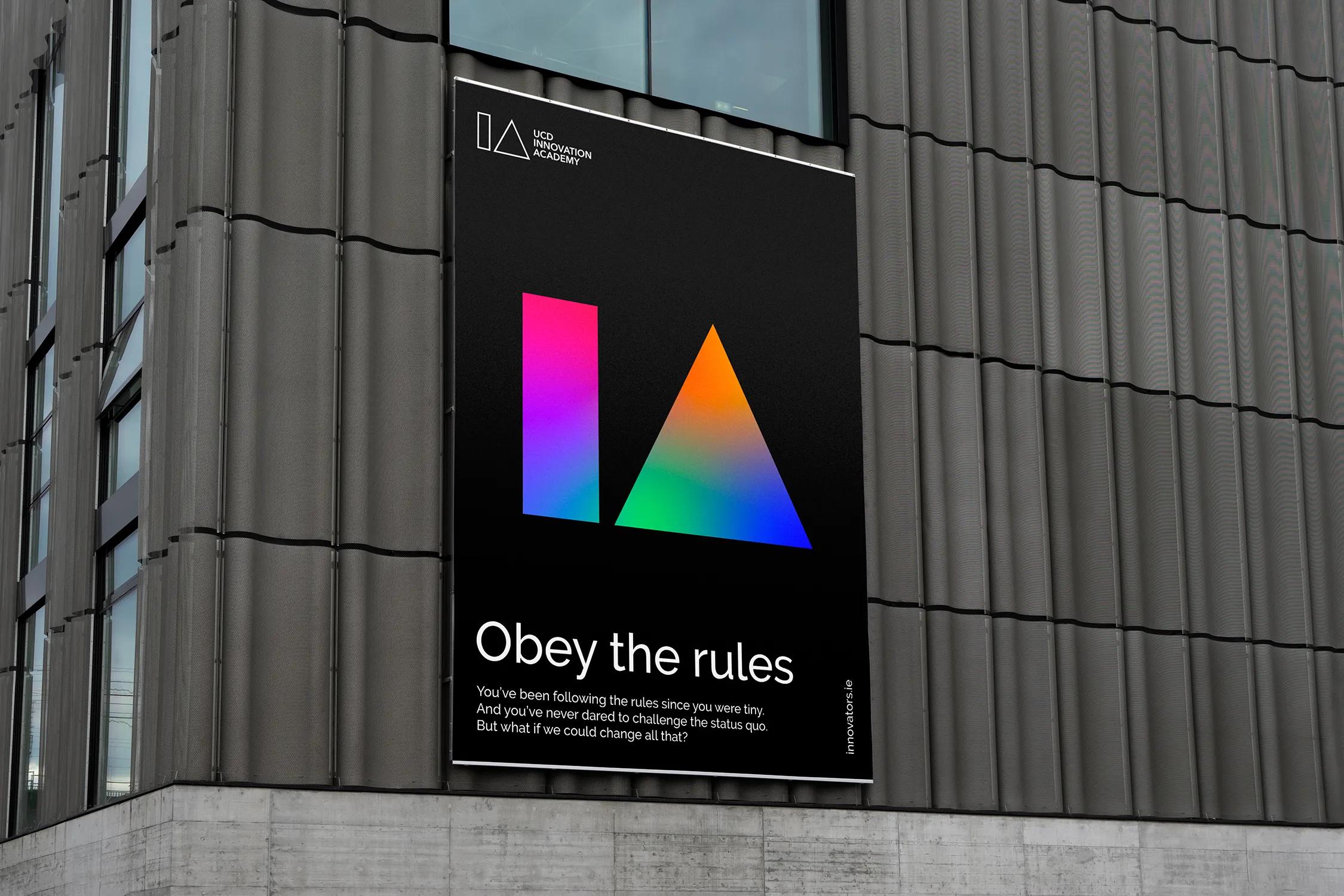 Billboard on a wall with the caption 'obey the rules'