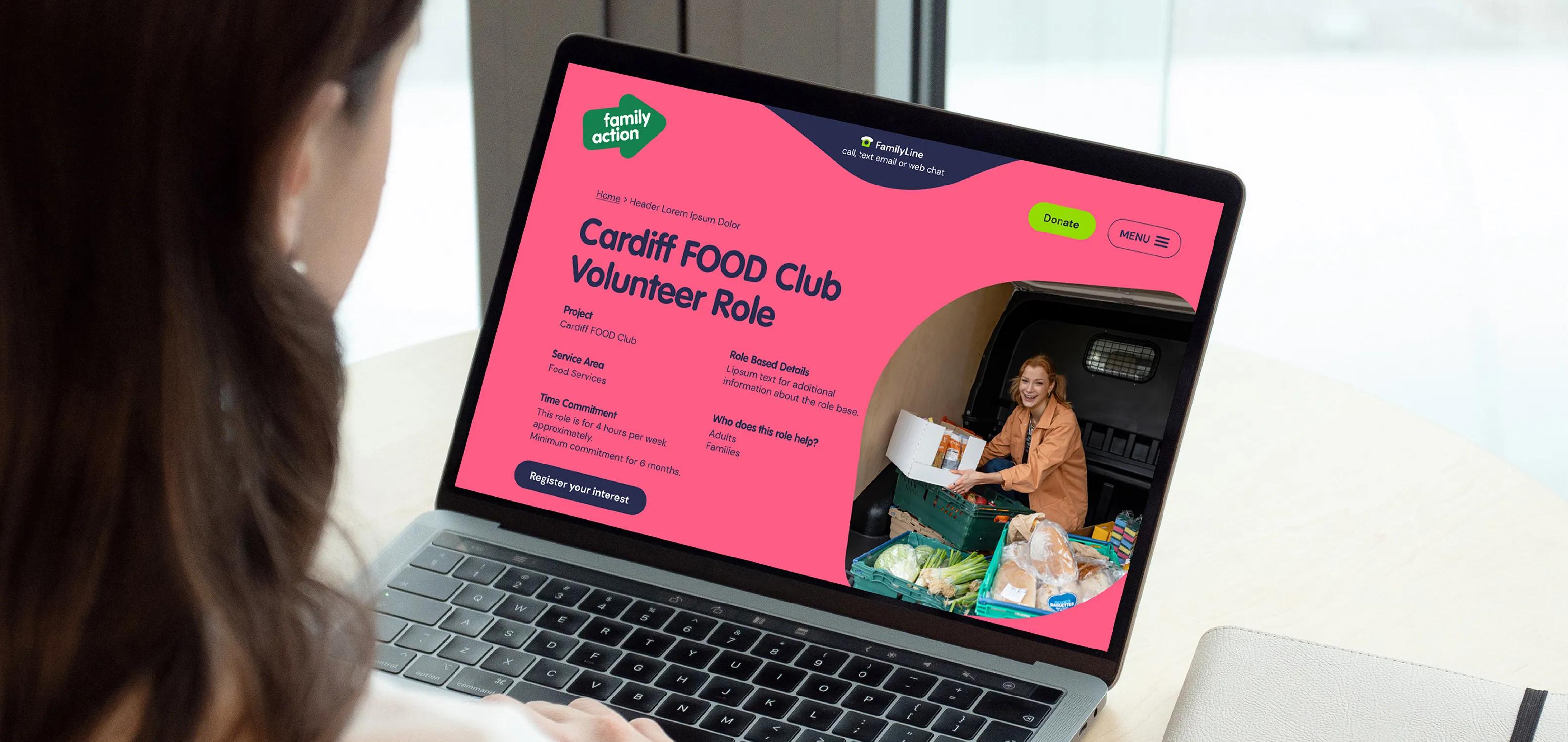 Woman looking up a food club on the family action website