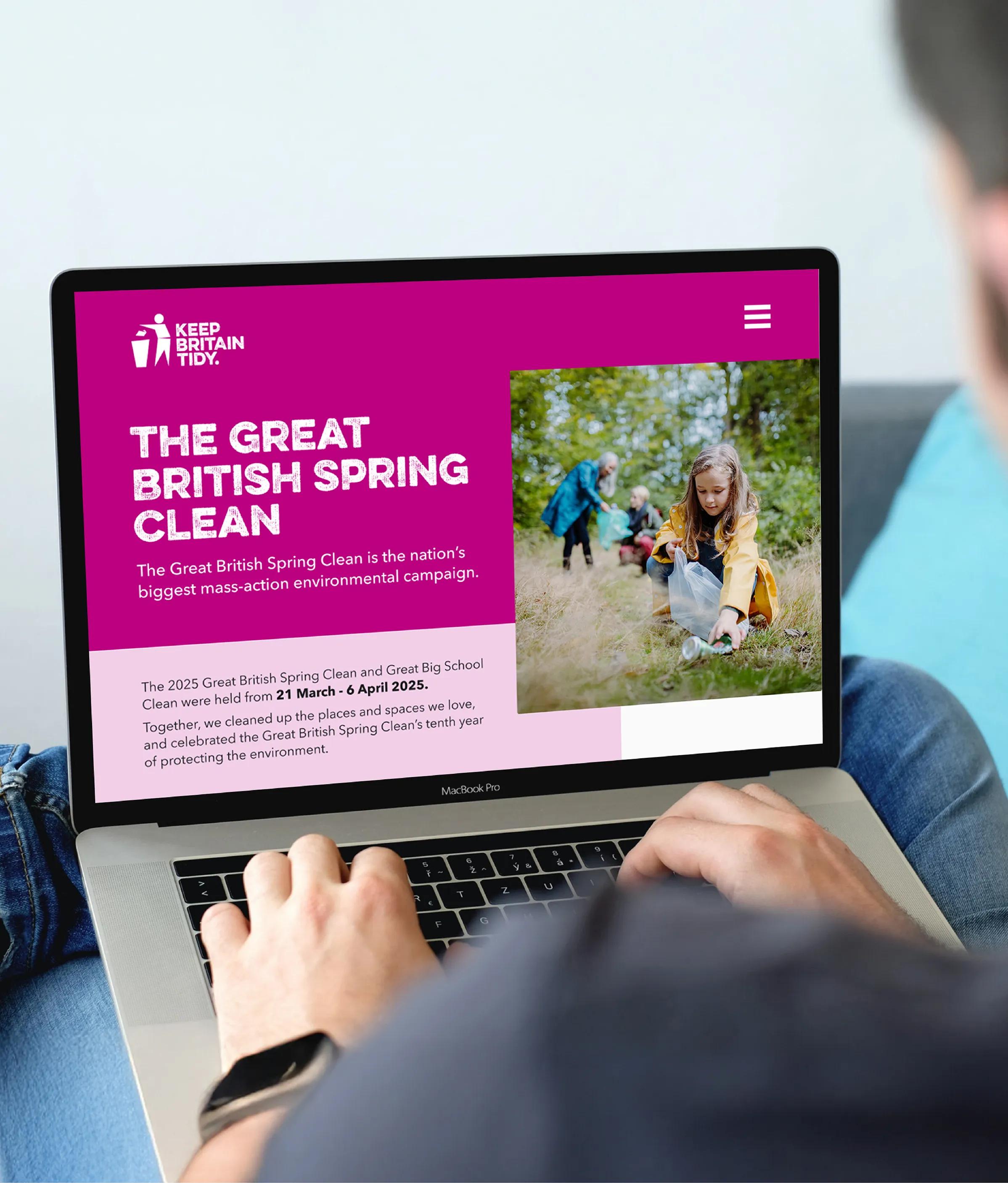 Website landing page shown on a laptop