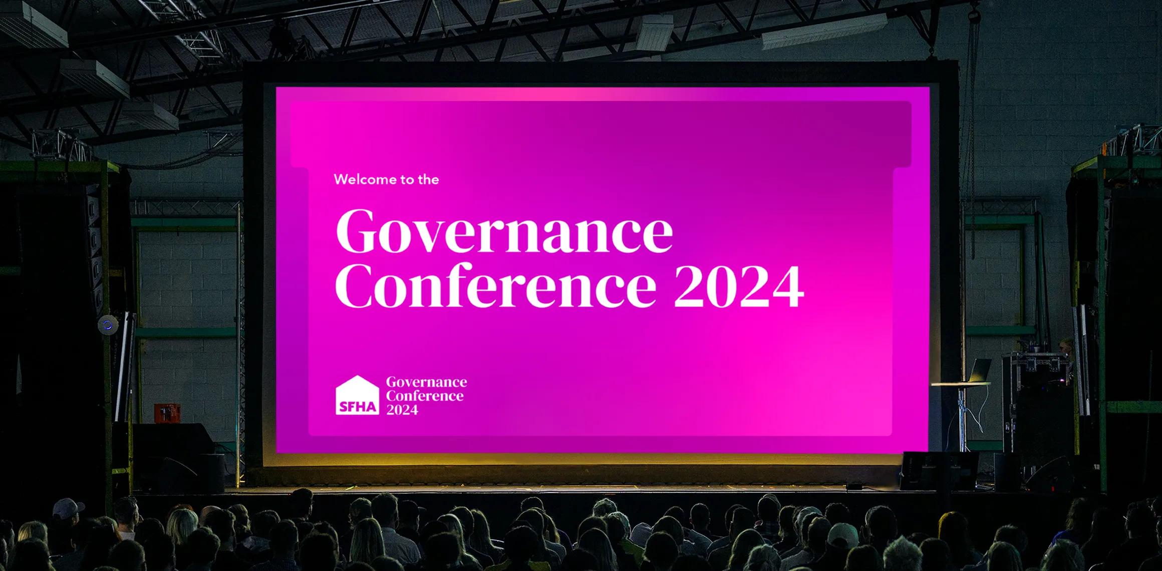 Presentation with governance conference 2024 signage