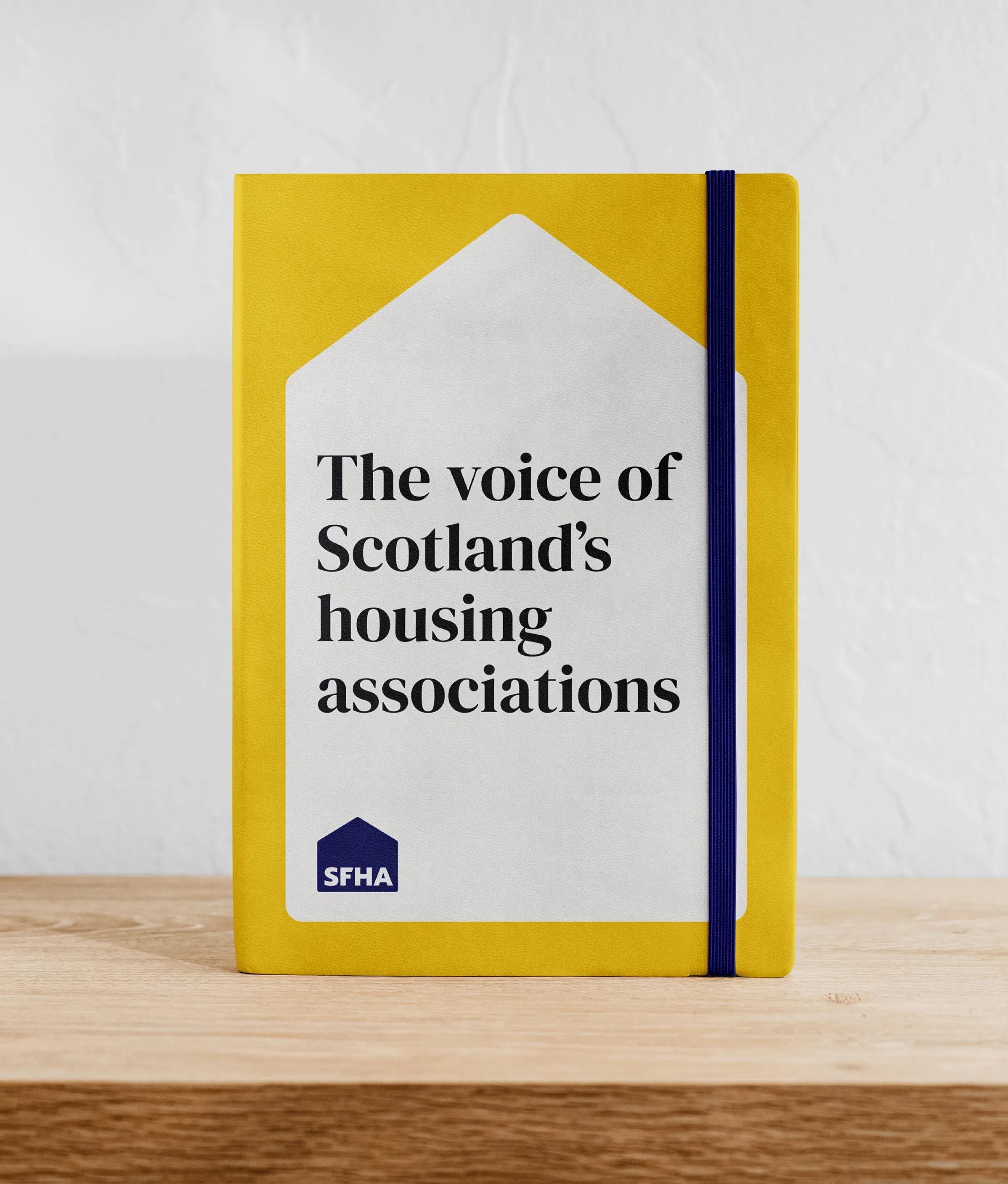 SFHA notebook with the caption 'the voice of scotland's housing assocations'