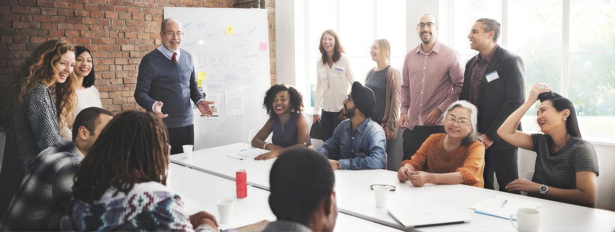 People chatting at a board meeting