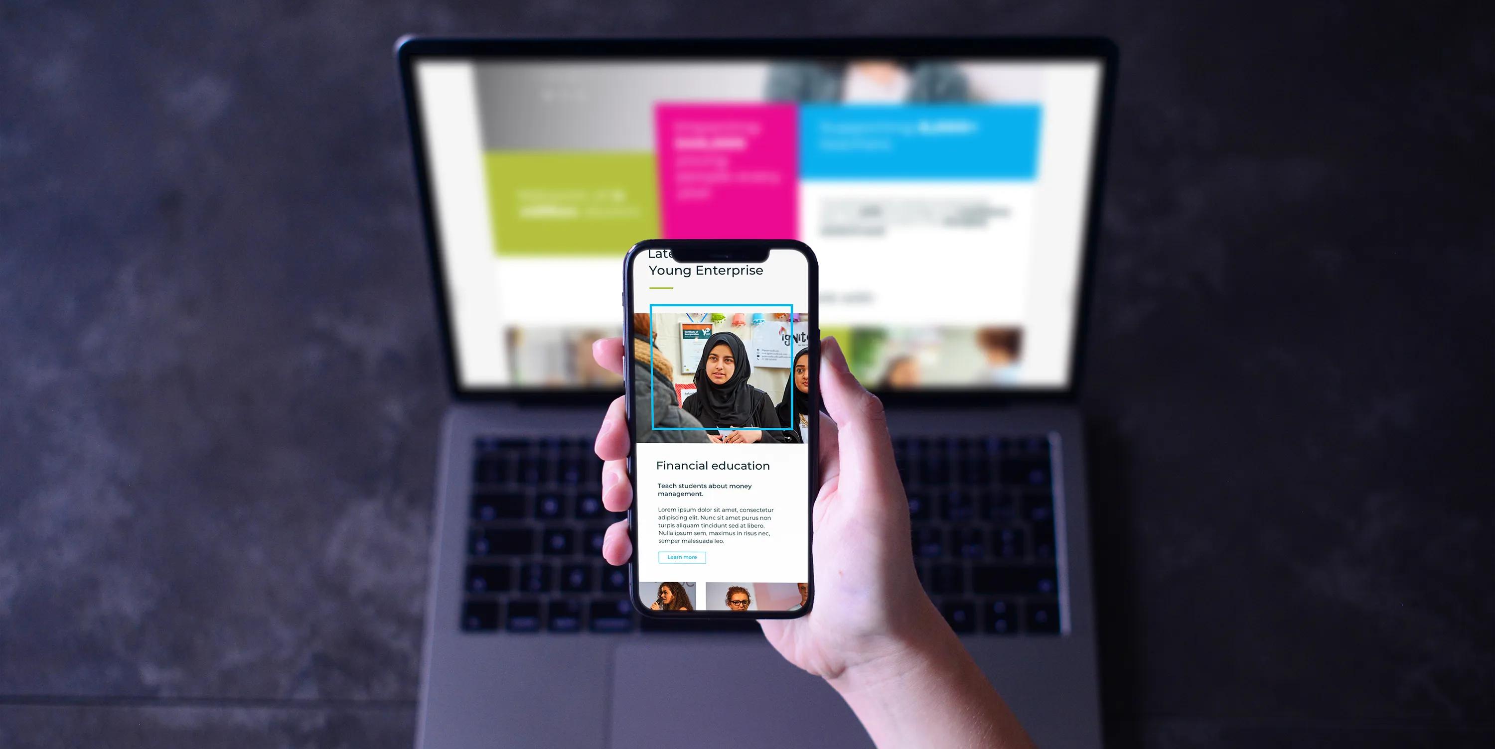 Website shown on the laptop and phone