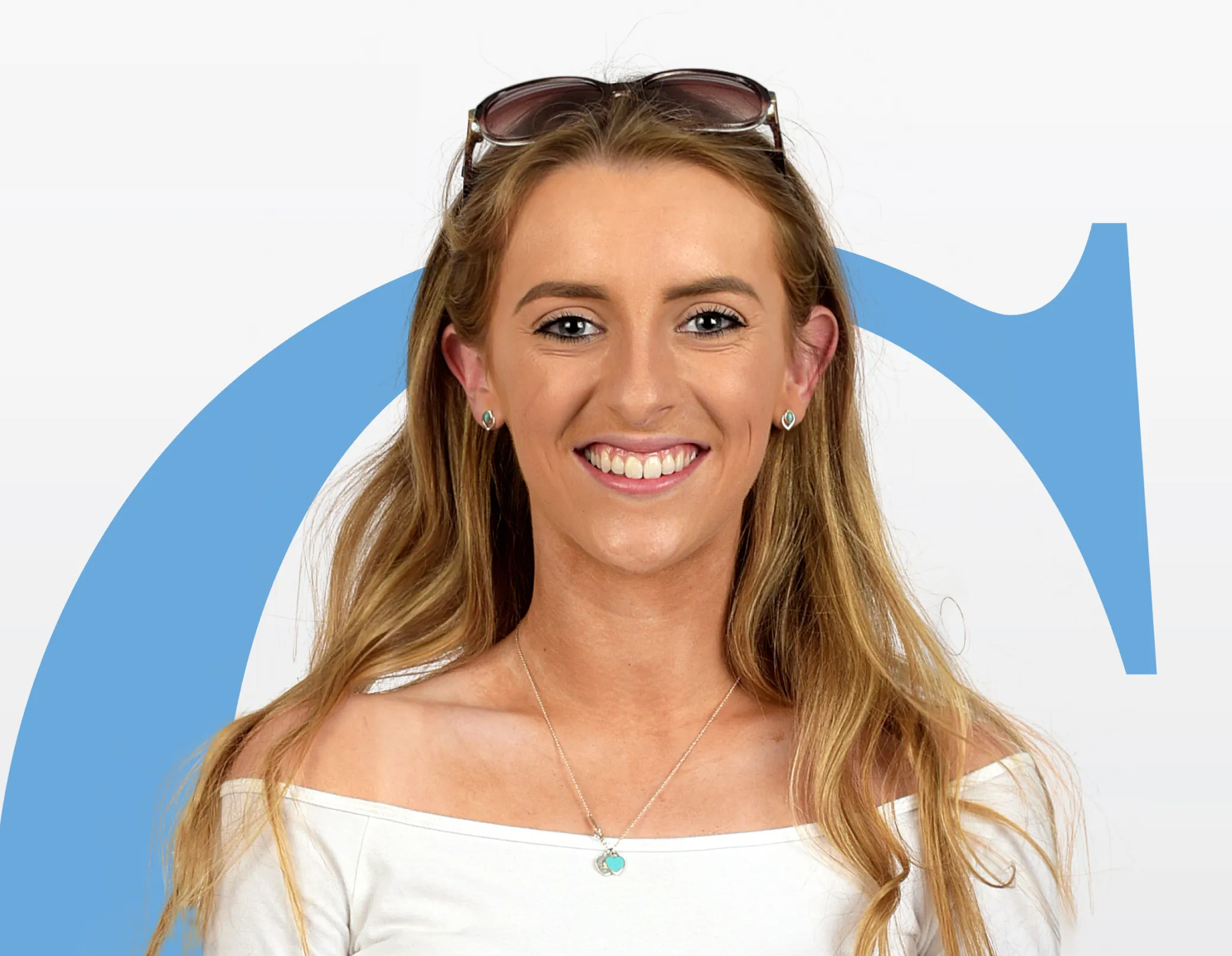 Girl smiling with C behind her
