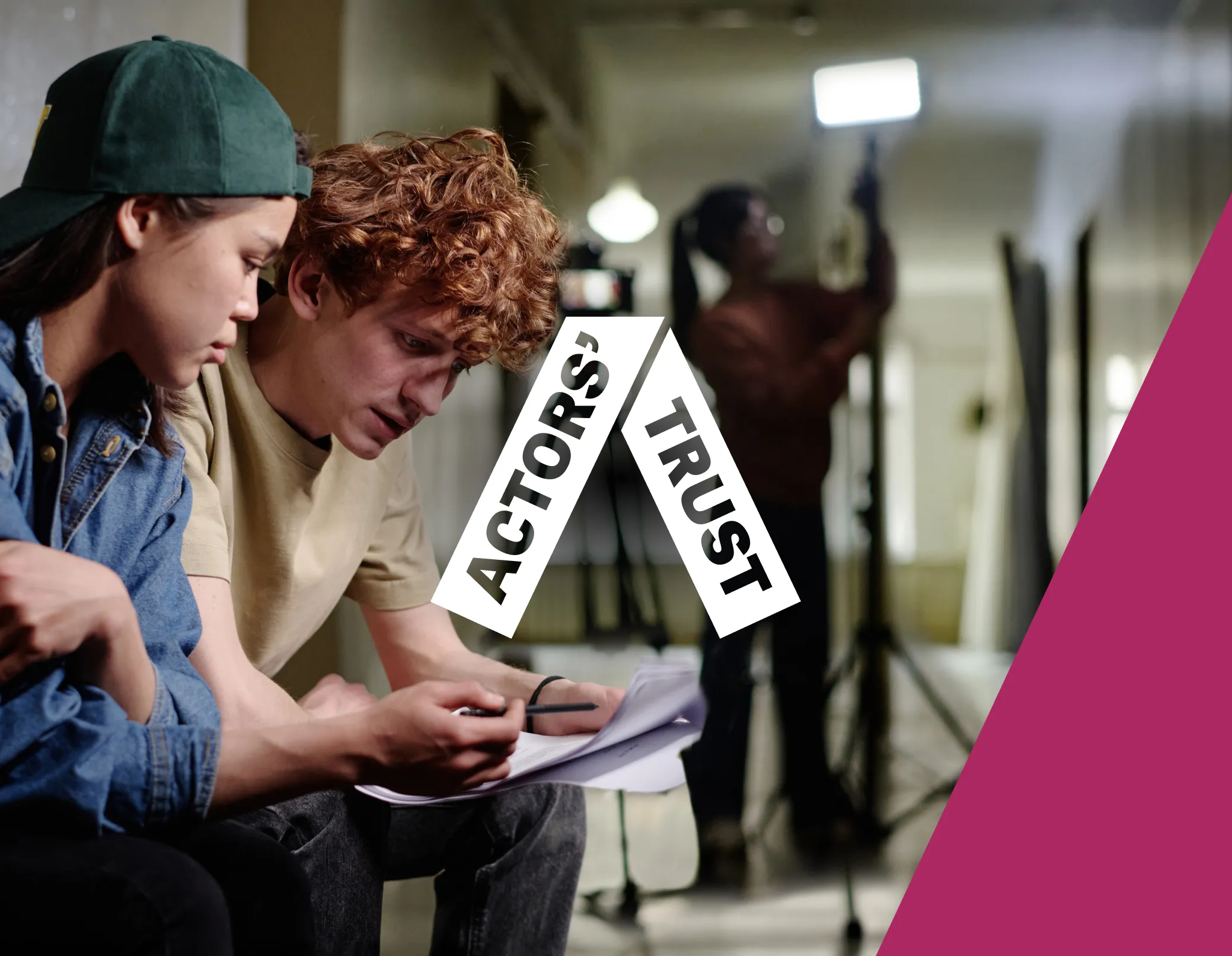 actors trust logo shown on a photo of a boy and a girl reading a script