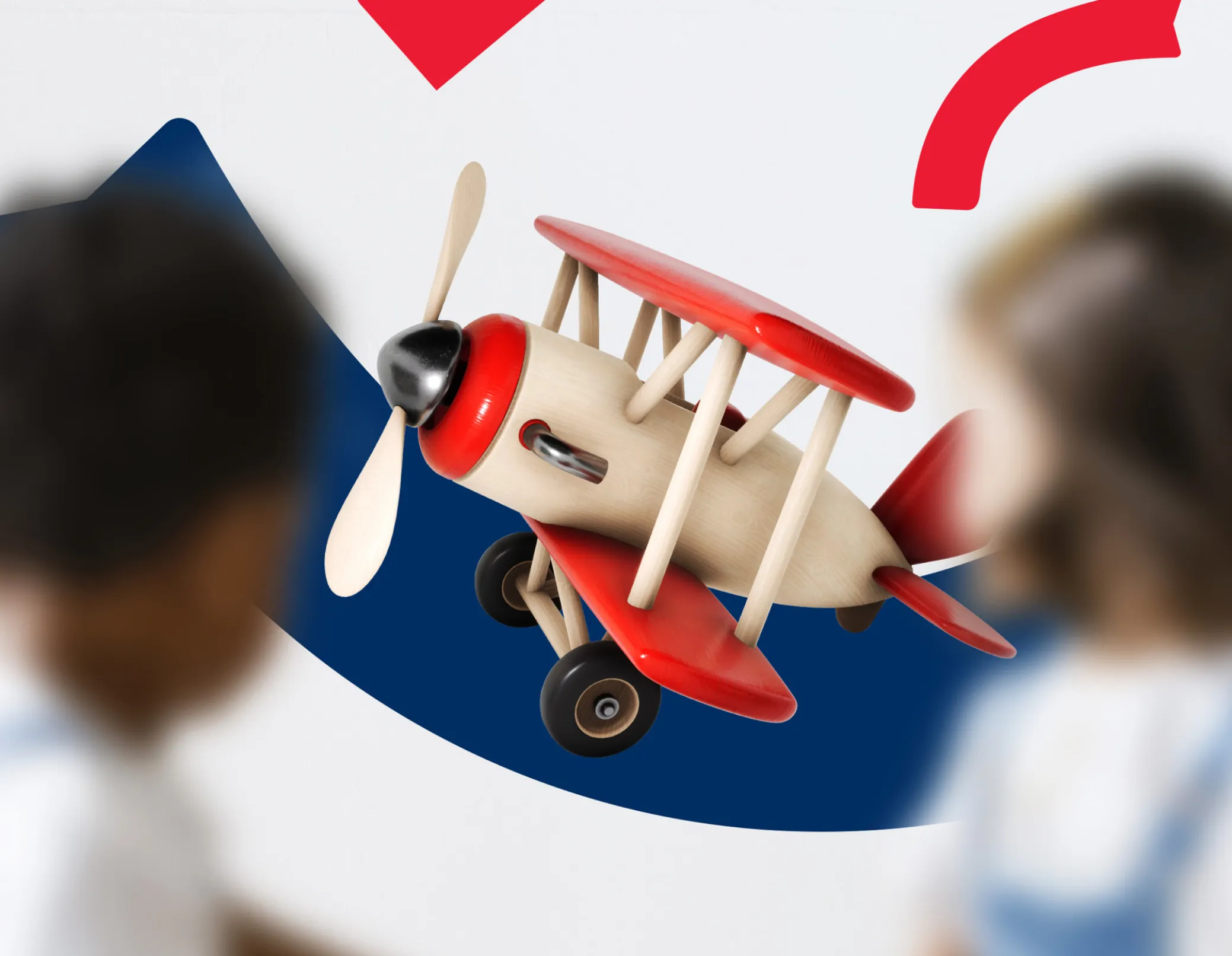 Children looking at a toy plane 