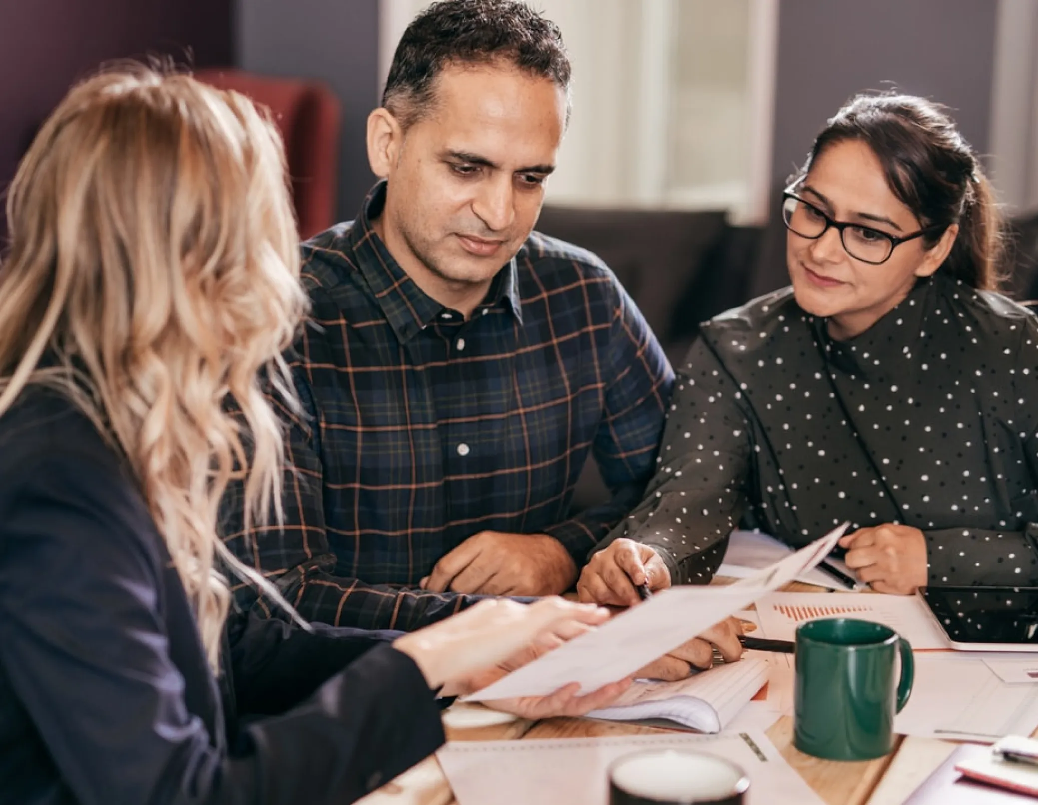 solictors talking round a table